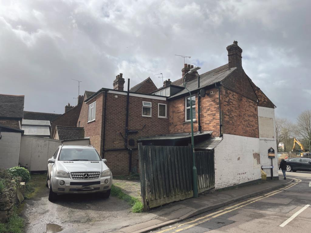 Lot: 31 - RETAIL AND RESIDENTIAL PREMISES WITH ADDITIONAL PLANNING FOR THREE FLATS - rear view of view of retail, investment and development property